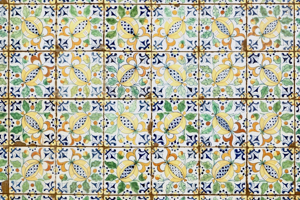 A field of 48 Dutch Delft polychrome &quot;Pomegranate&quot; tiles for the English market, 19th C.